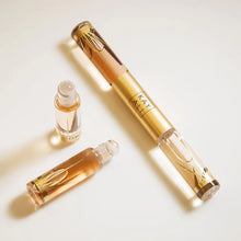 Cargar imagen en el visor de la galería, Kayali Déja Vu White Flower | 57 & Invite Only Amber | 23 Eau De Parfum Intense Rollerball (2 x 5ml)
